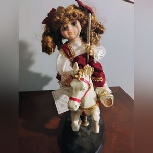 Collectors Choice Porcelain Doll On Carasel Horse